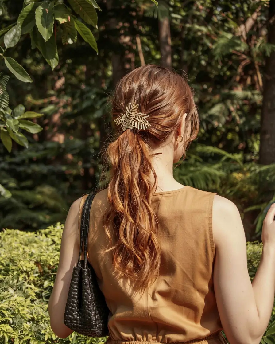 cute fall hairstyles ideas 2025 Wavy Pony with Gold Accent