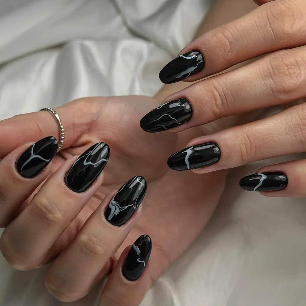 black fall nails 2025 Marble Veins in Midnight