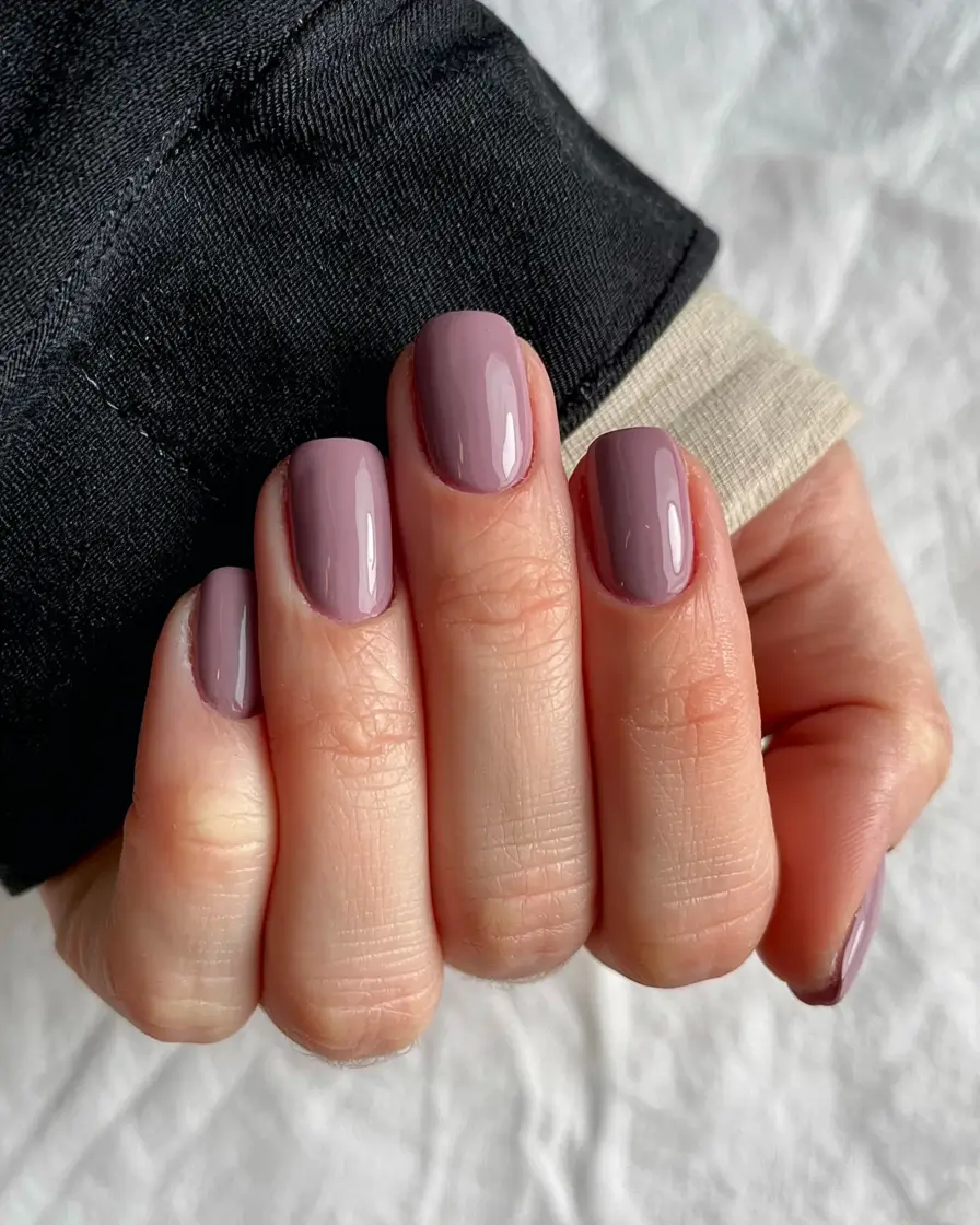 fall 2025 nail color ideas for women over 40 Dusty Mauve Elegance