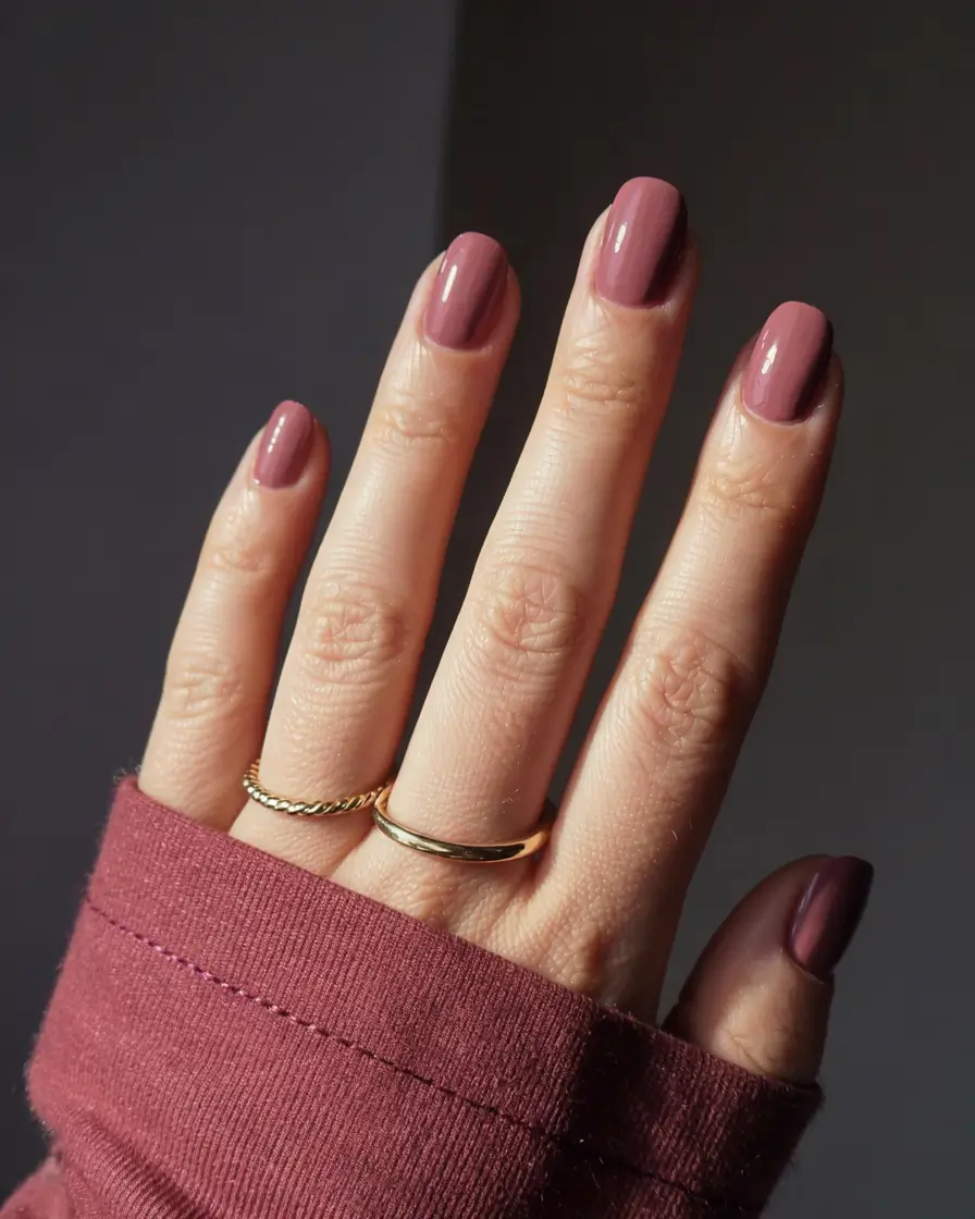 fall 2025 nail color ideas for women over 50 Muted Rosewood Charm