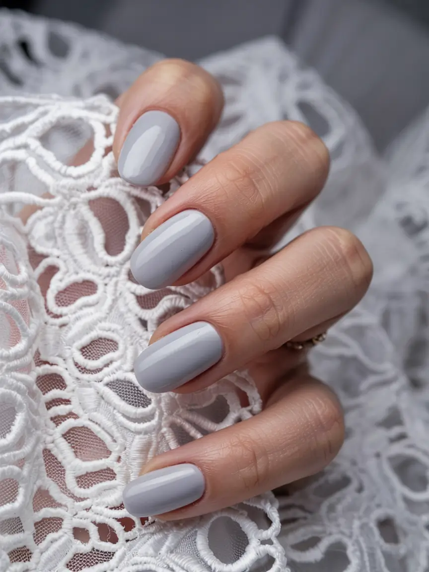 fall 2025 nail color ideas for women over 60 Pale Grey Modernity