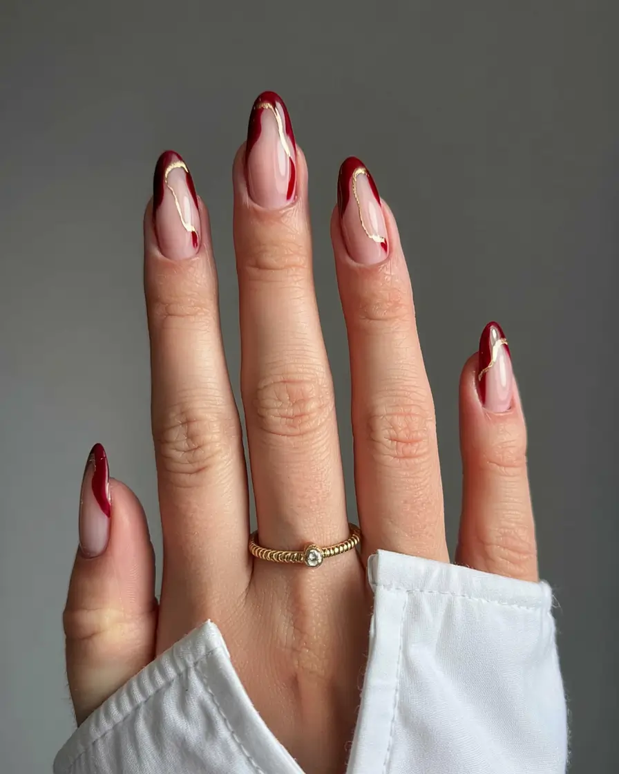 fall 2025 nail trends Wine French With Gold Swirls