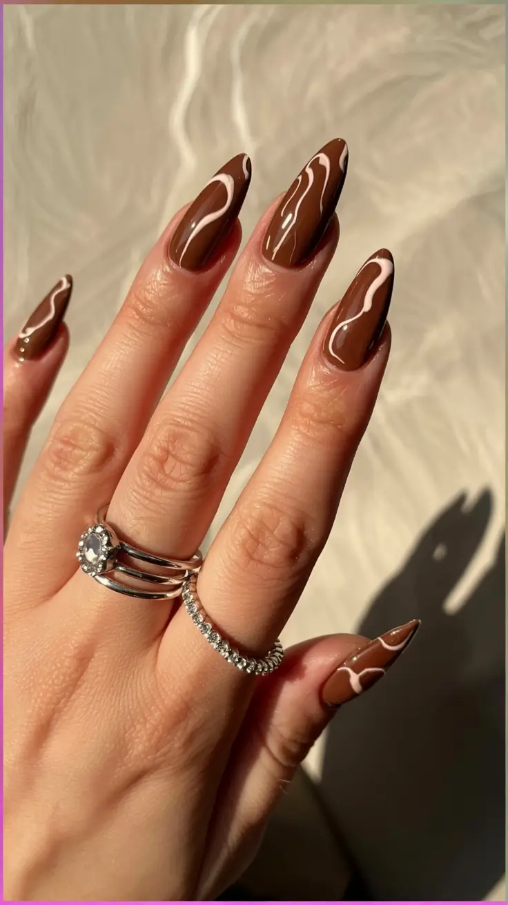 fall 2025 nail trends Chocolate Swirls