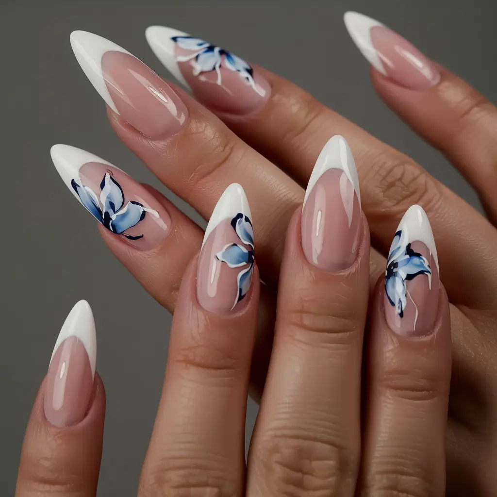 fall almond nails 2025 White-Tipped Florals with Blue Accents