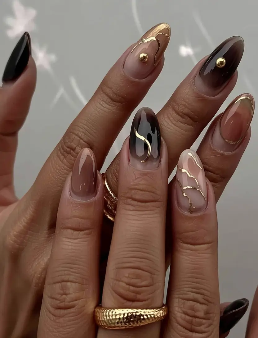 fall almond nails 2025 Black and Gold Abstract Drama