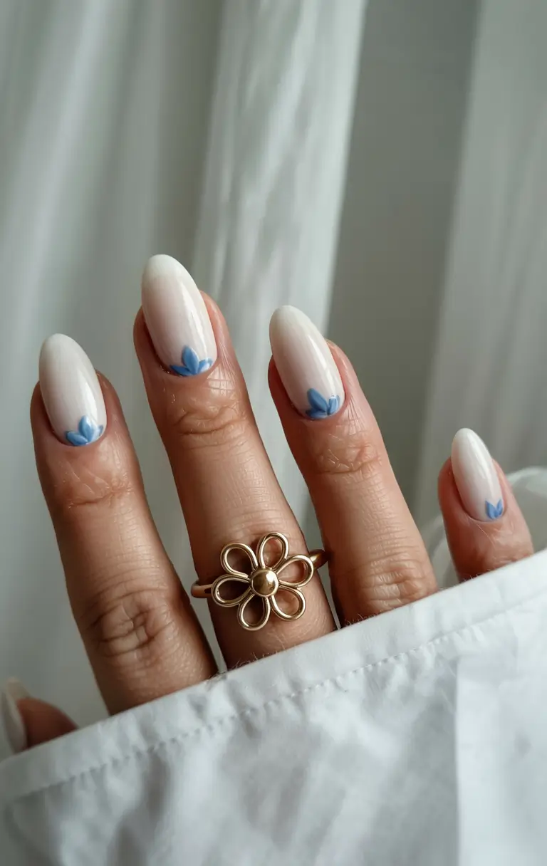 fall almond nails 2025 Minimal Blue Petal Accents