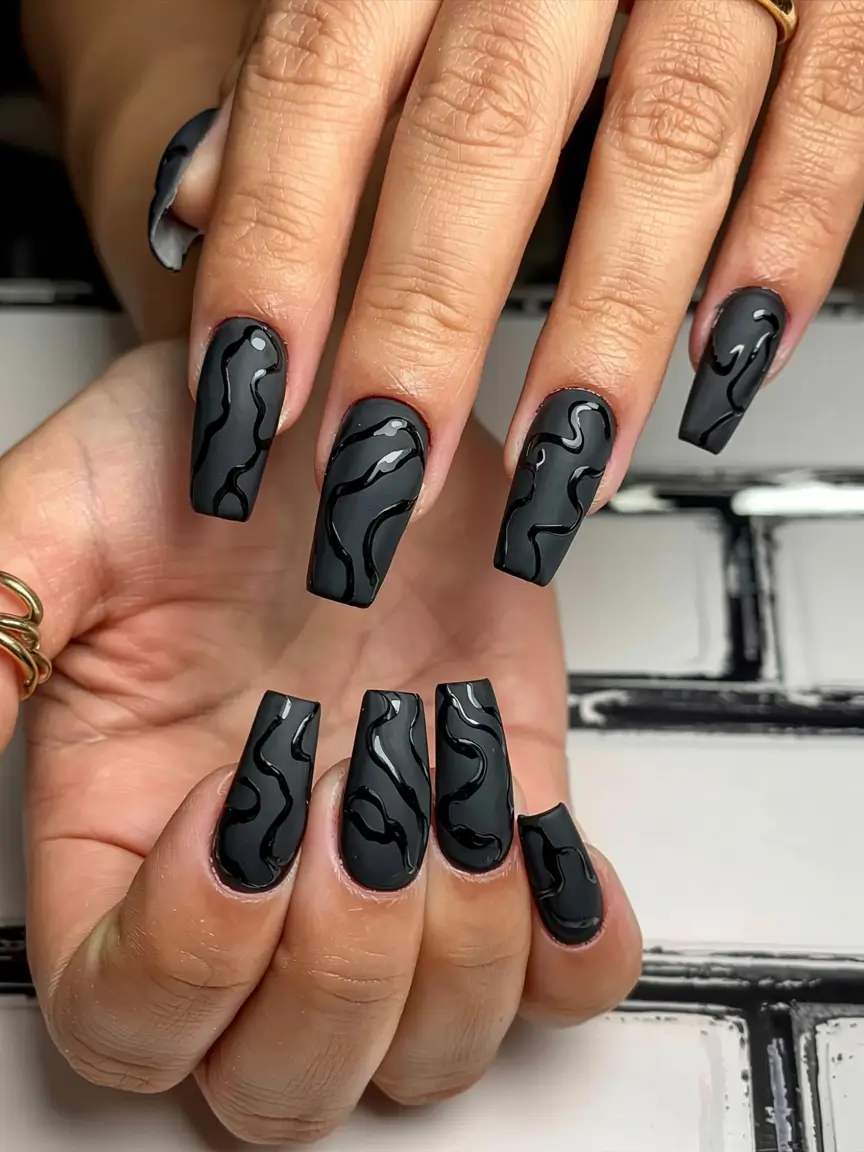 fall black nail designs 2025 Matte Black with Glossy Swirls