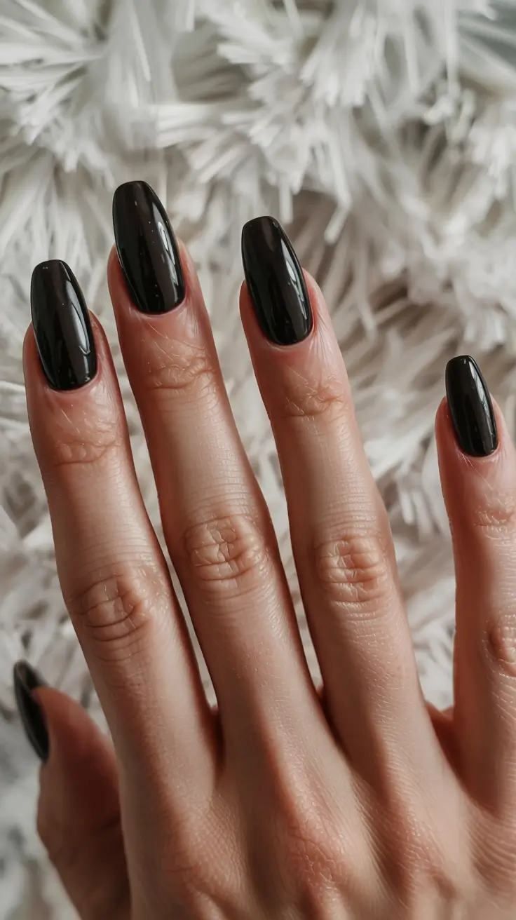 fall black nail designs 2025 Glossy Black on Medium Coffin Nails