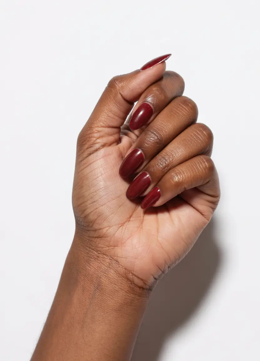 fall nail colors for brown skin 2025 Classic Crimson Charm