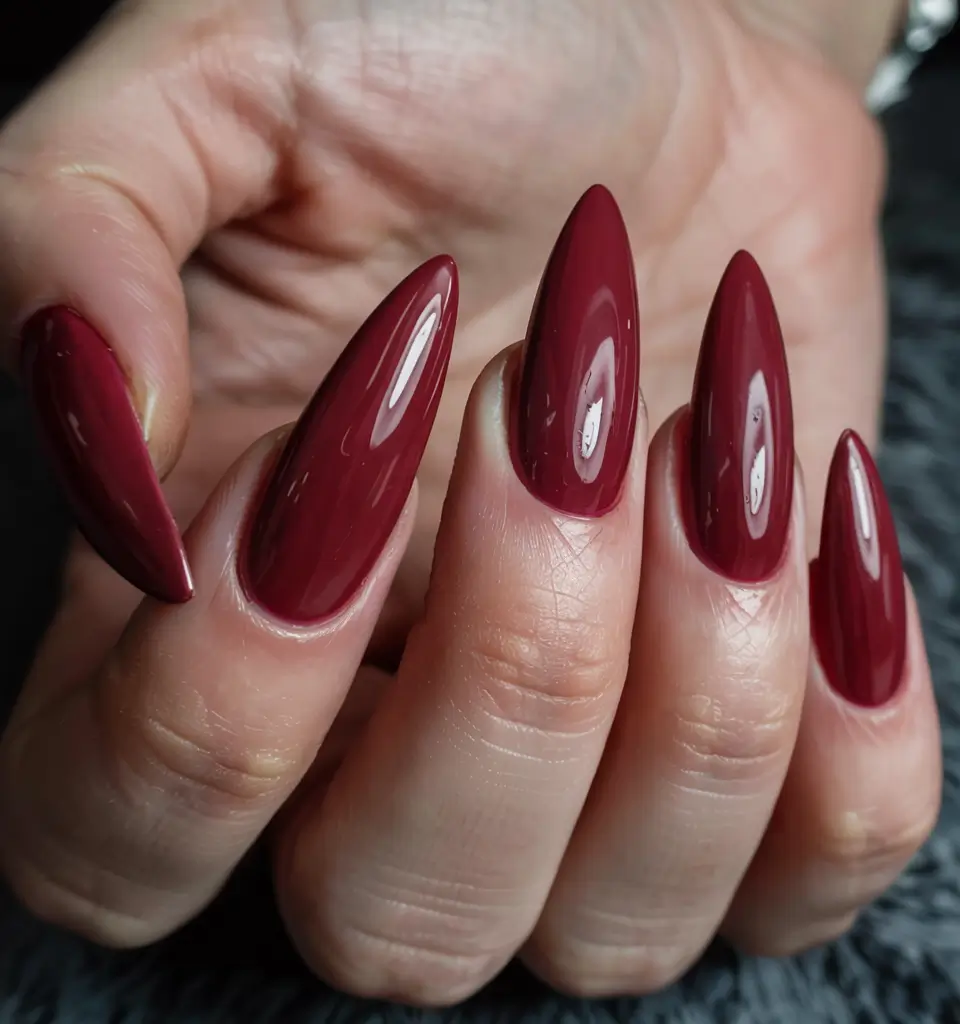 fall stiletto nails 2025 Deep Ruby Gloss