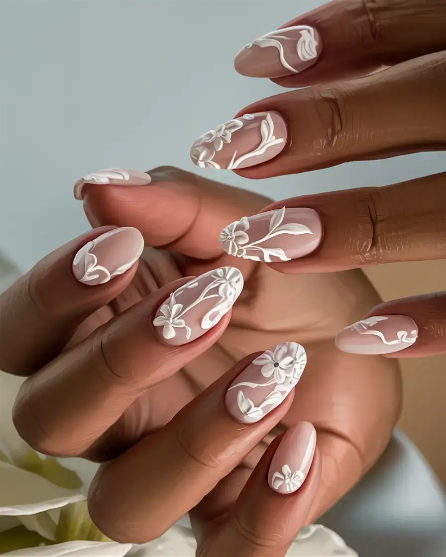 fall wedding nails 2025 Dimensional White Florals Over Nude Base