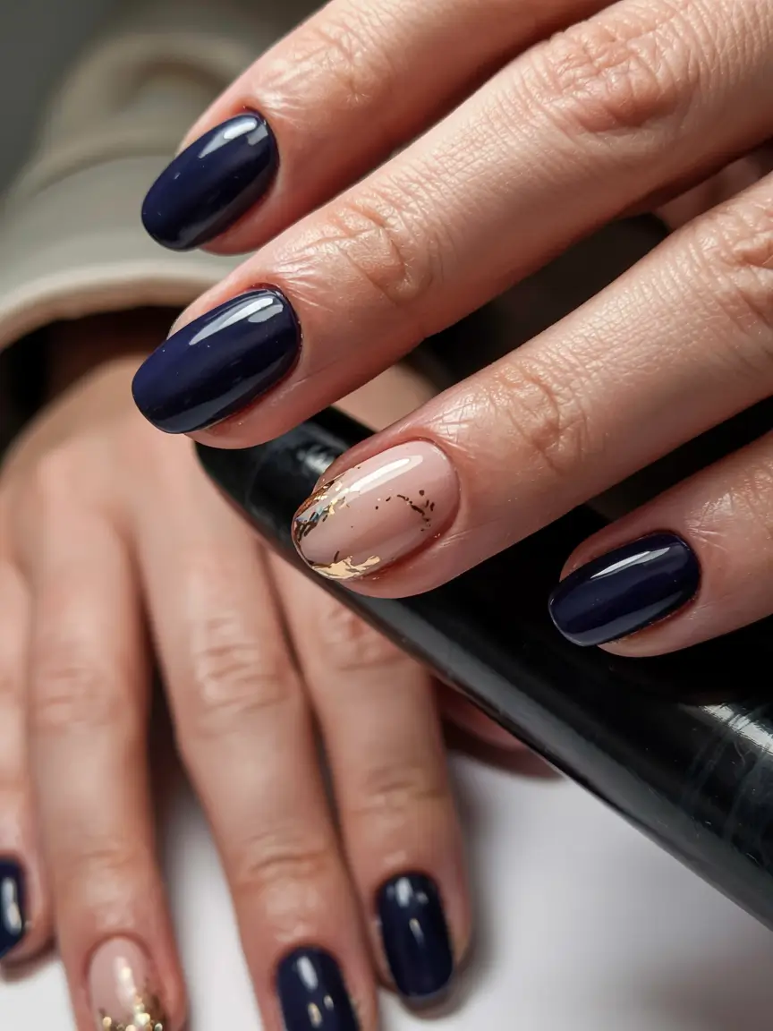 navy blue fall nail ideas for 2025 Modern Navy with Gold Leaf Accents