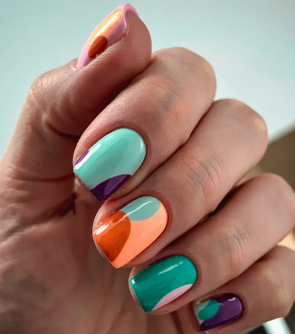 fall color-block nails 2025 Playful Swirls of Color