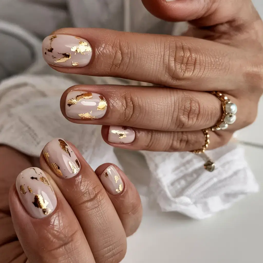 fall foil accent nails 2025 Warm Beige with Scattered Gold Foil