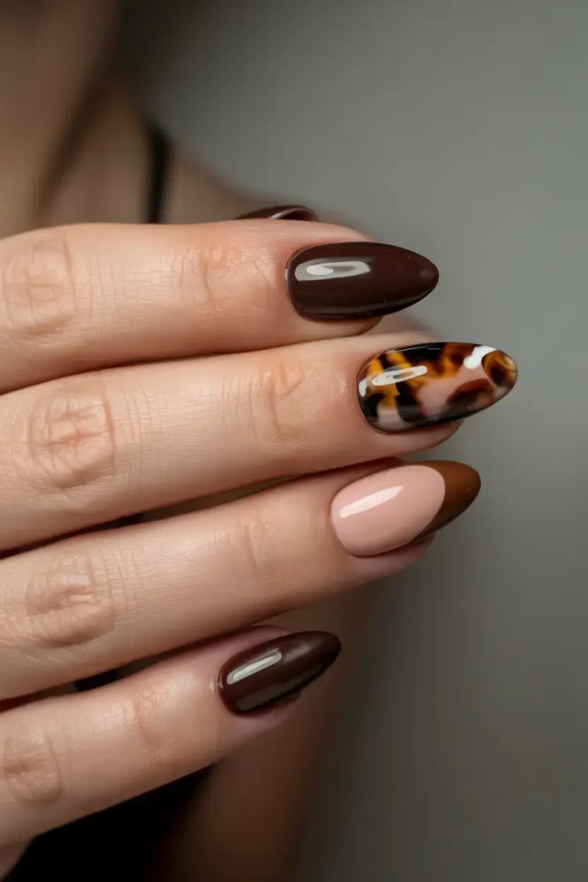 fall tortoiseshell nails 2025 Layered Neutrals with Tortoiseshell Accent