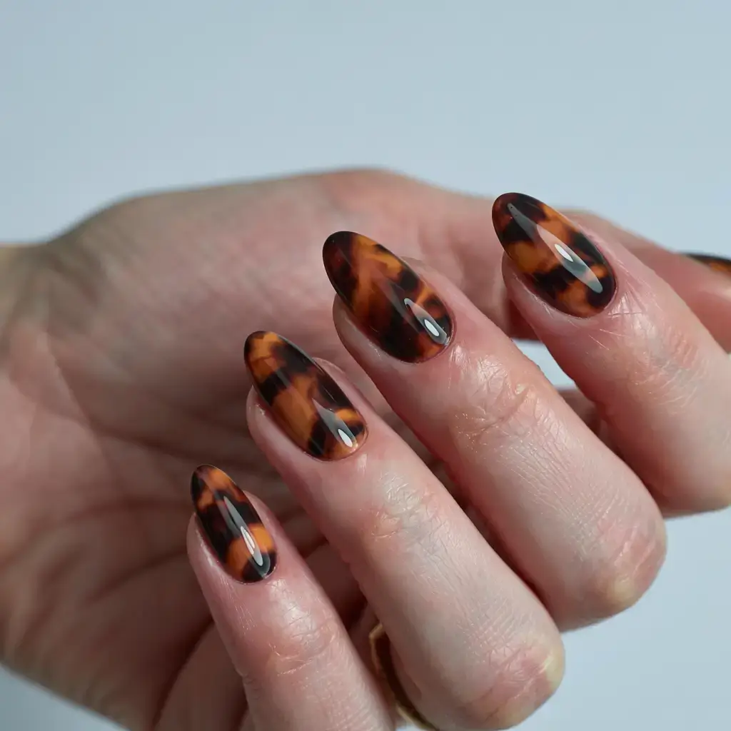 fall tortoiseshell nails 2025 Rich Amber Glow