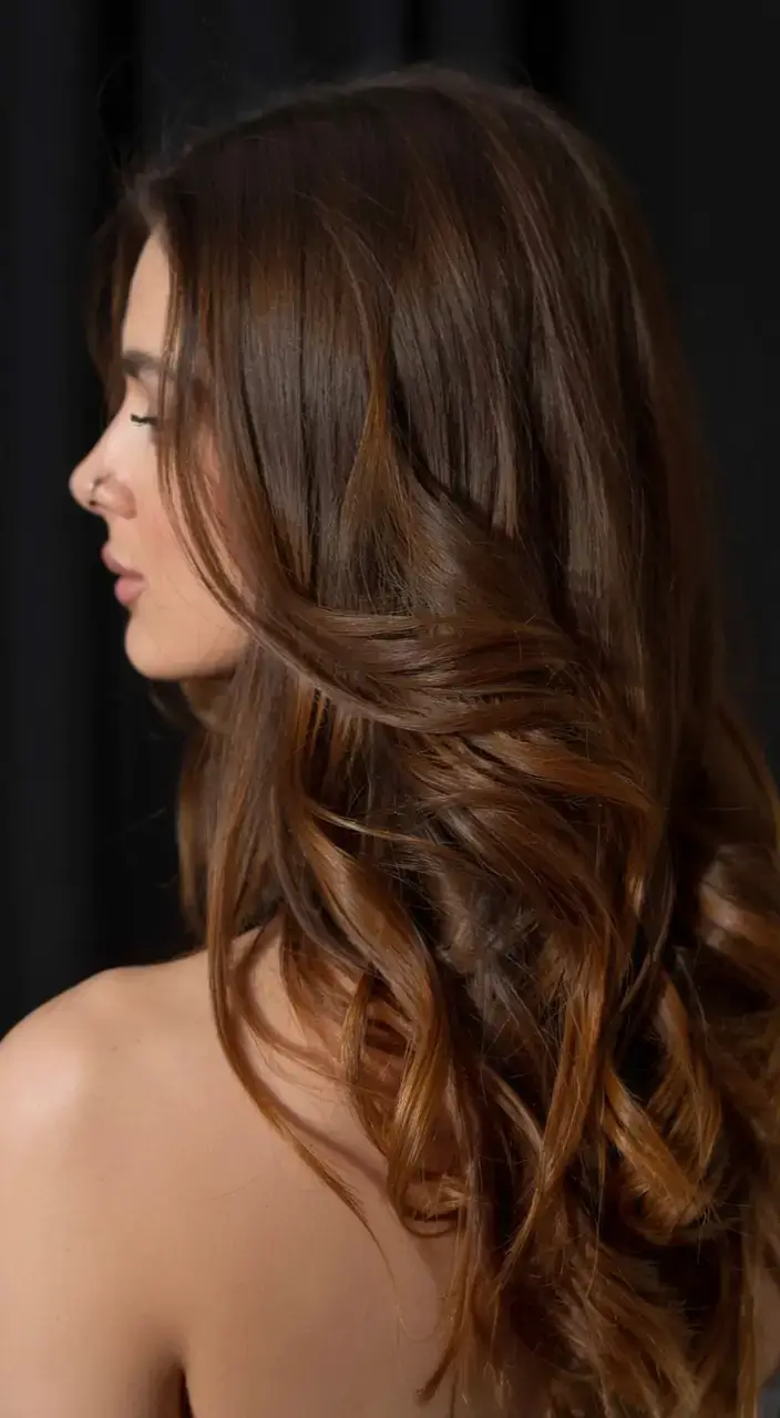 october hair color ideas fall trends for 2025 Chestnut Layers with Subtle Shine