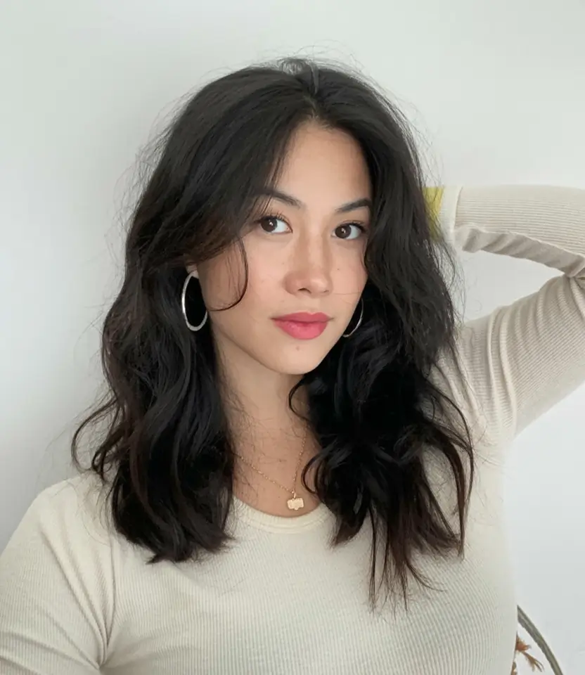 winter medium haircut ideas 2025 2026 Soft Waves with Playful Volume
