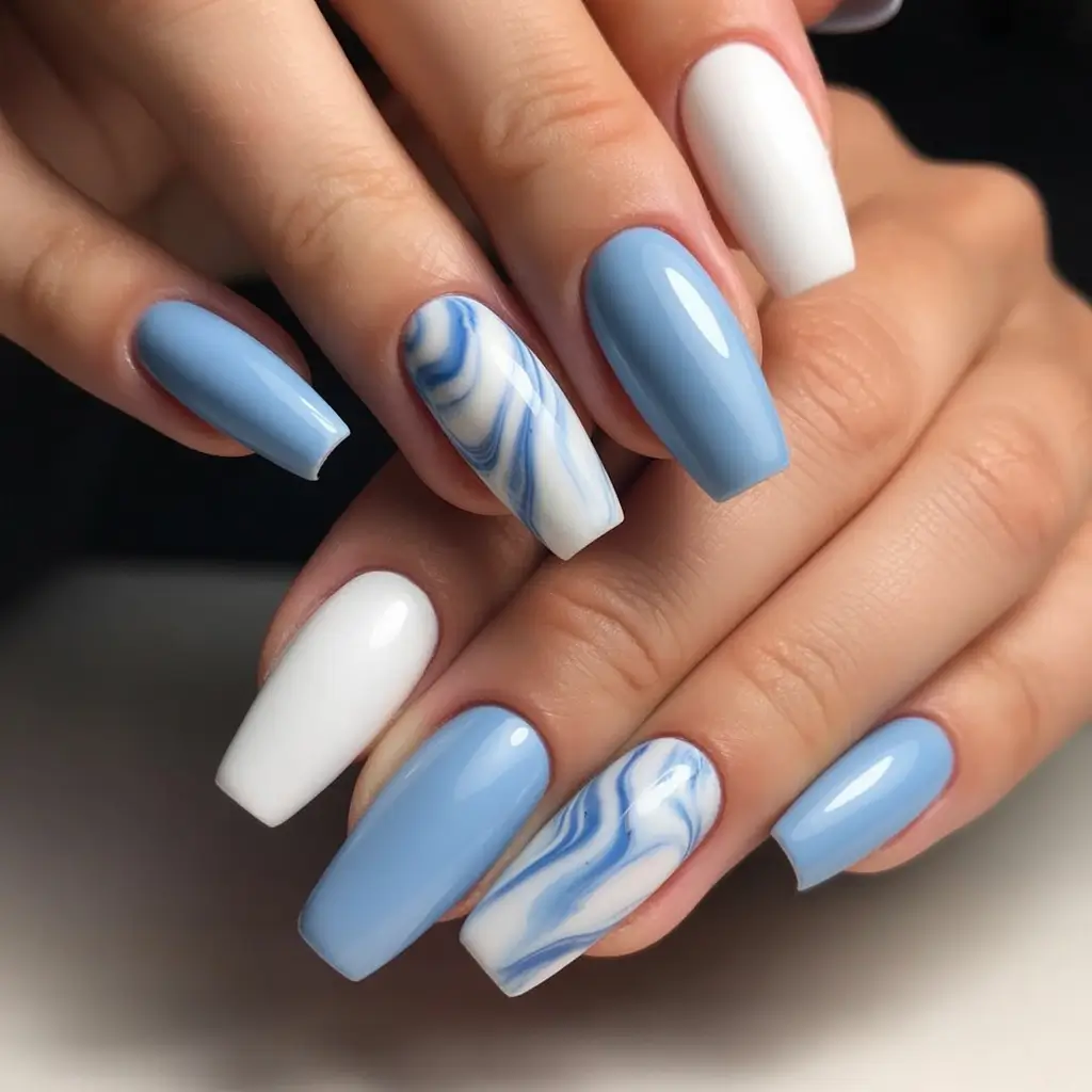 blue nail trends for winter 2025 2026 Winter Marble Whispers