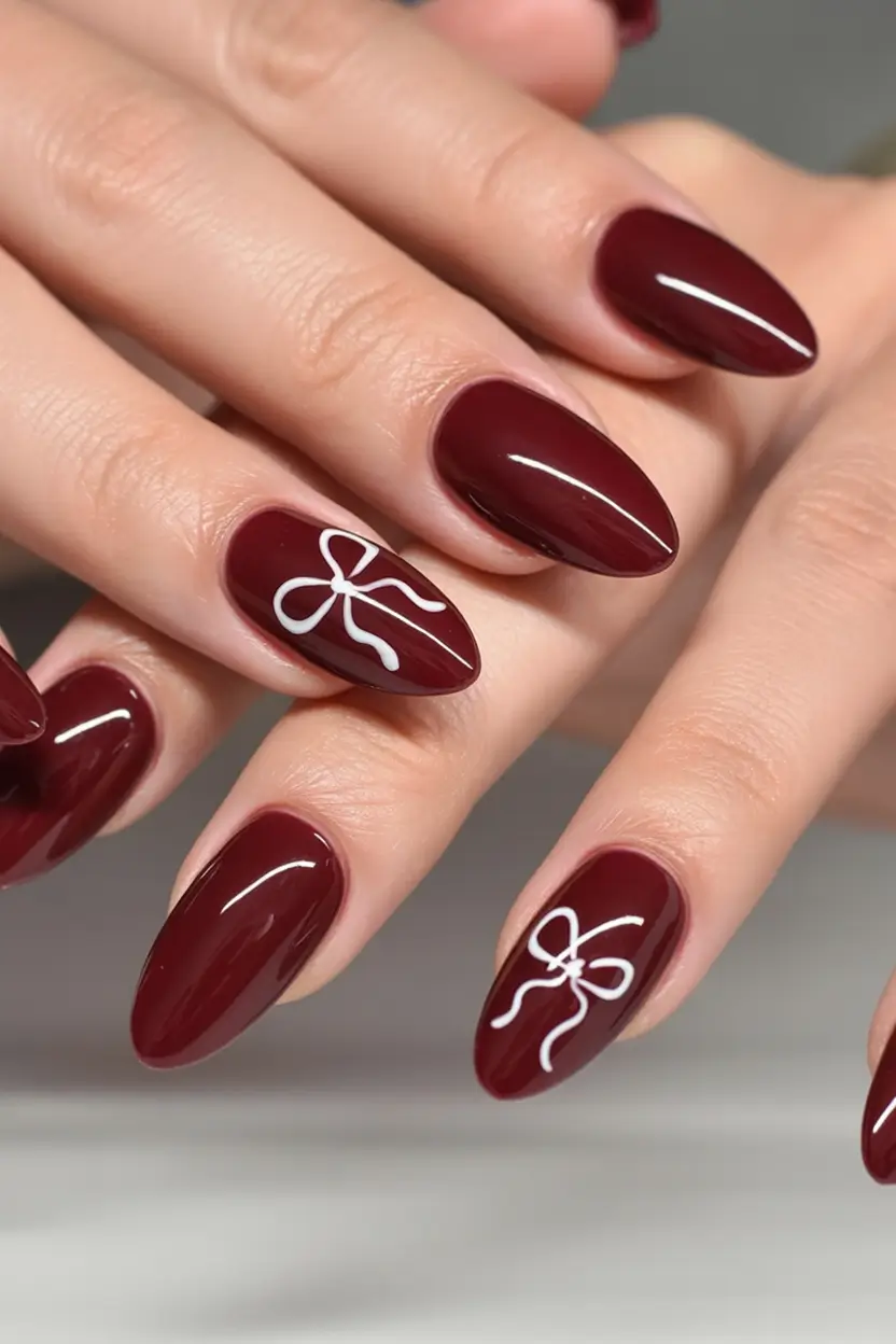 burgundy winter nails colors 2025 2026 Ribbon-Tied Romance