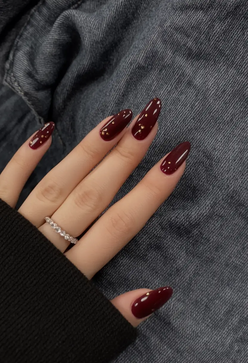 burgundy winter nails colors 2025 2026 Golden Kiss Minimalism