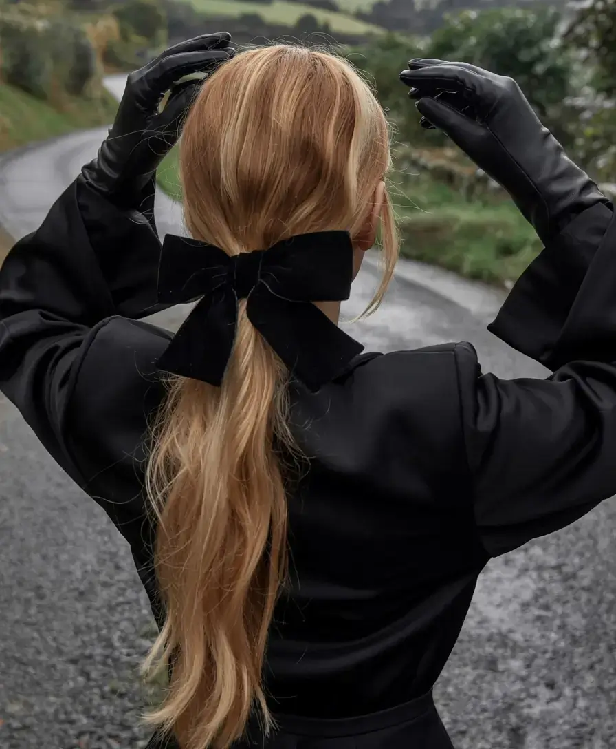 cute winter hairstyles 2025 2026 inspiration Velvet Bow Ponytail with Cinematic Energy