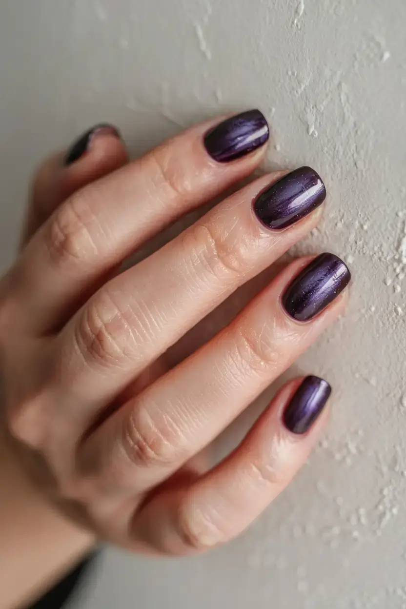 dark winter nail colors ideas 2025 2026 Midnight Plum Glow
