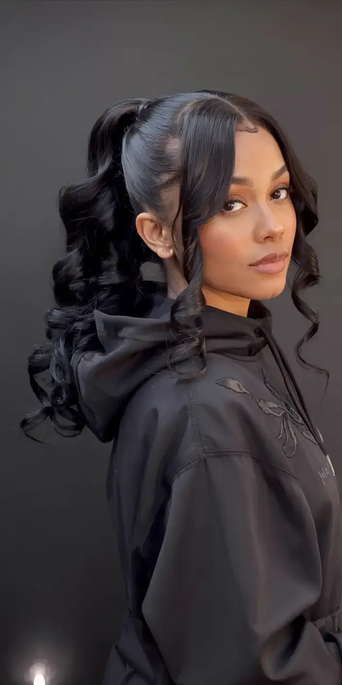 hairstyles for black women winter 2025 2026 Curly High Ponytail with Soft Tendrils