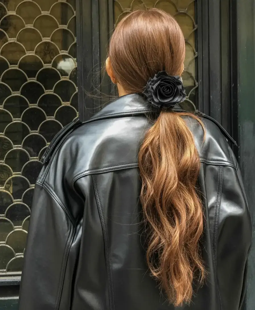 hairstyles ideas for winter 2025 2026 Modern Ponytail with Statement Accessory