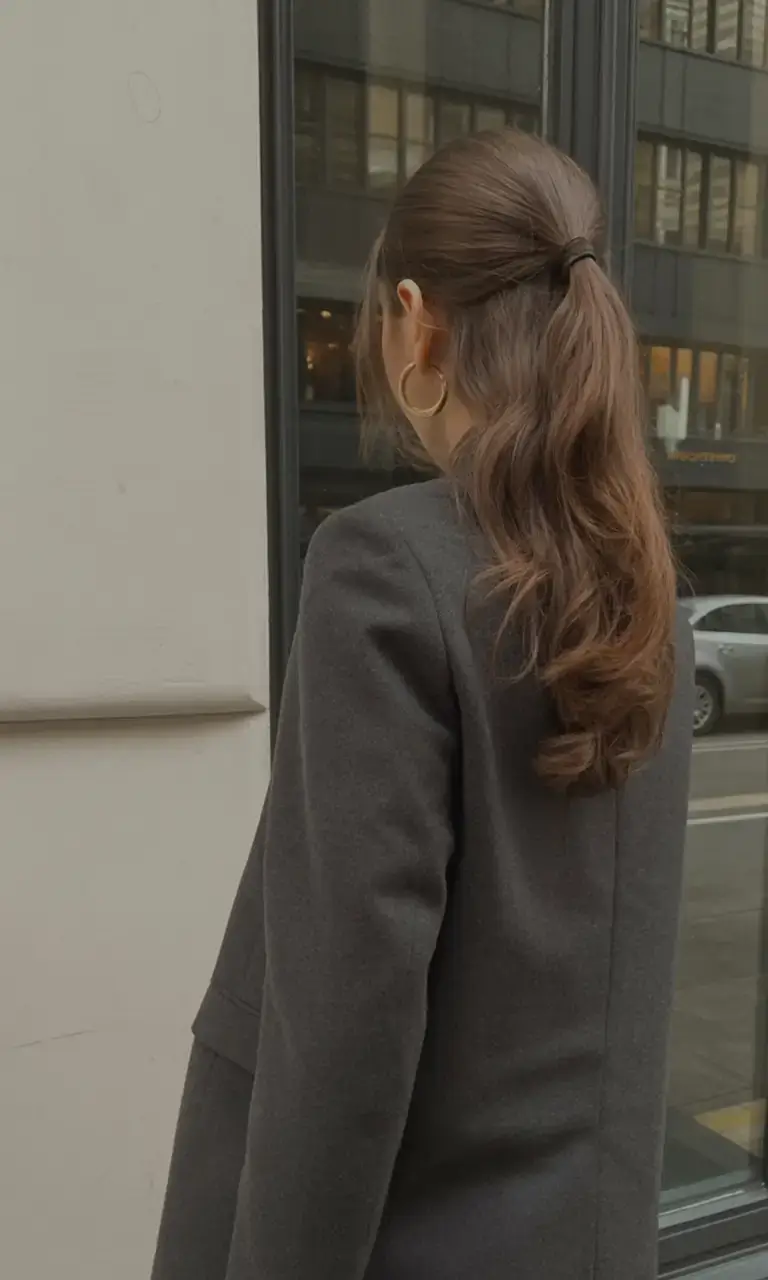 hairstyles ideas for winter 2025 2026 Low Ponytail with Gentle Waves