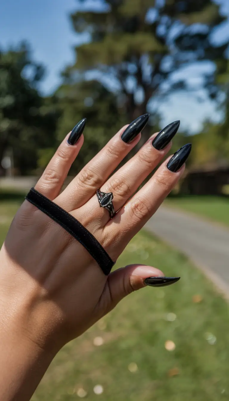 modern dark nail inspo winter 2025 2026 Raven Gloss