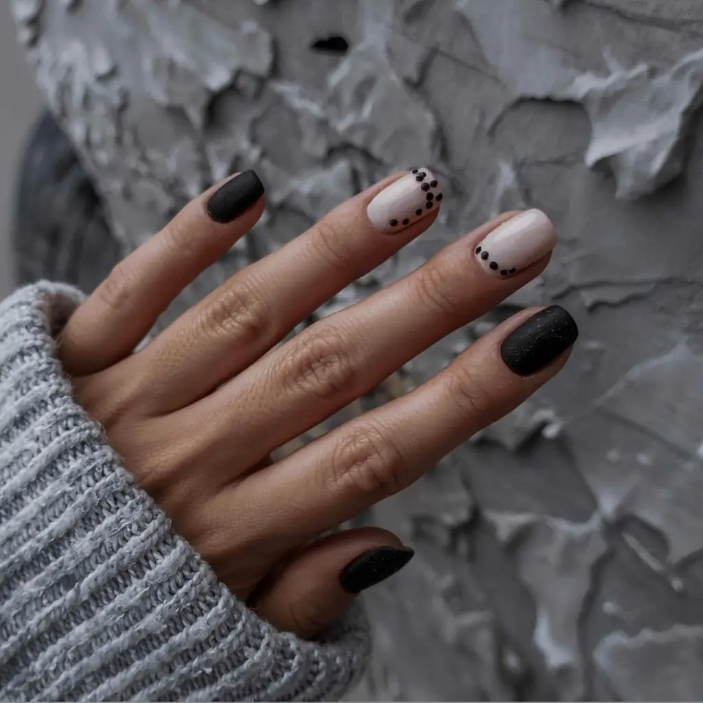 modern gel manicure winter 2025 2026 Frosted Noir Dots