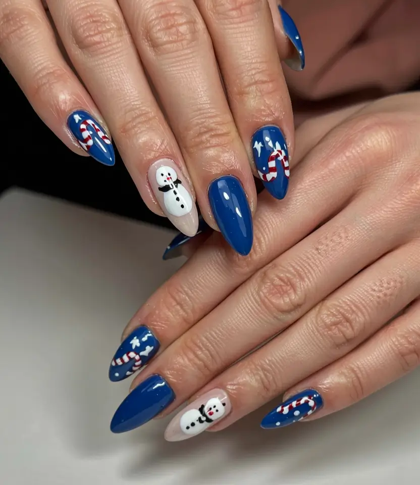 Trendy Blue Nail Ideas Christmas 2025 Playful Candy Blue Noel