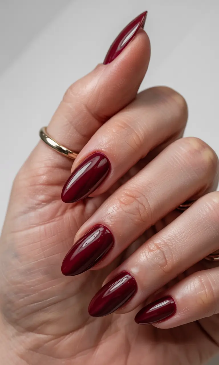 winter manicure colors 2025 2026 Crimson Muse
