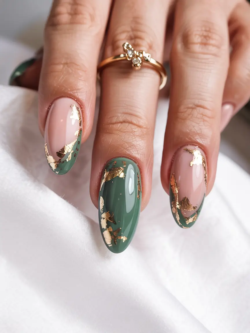 winter nail designs colors 2025 2026 Emerald Aura Green with Gold Foil Detailing