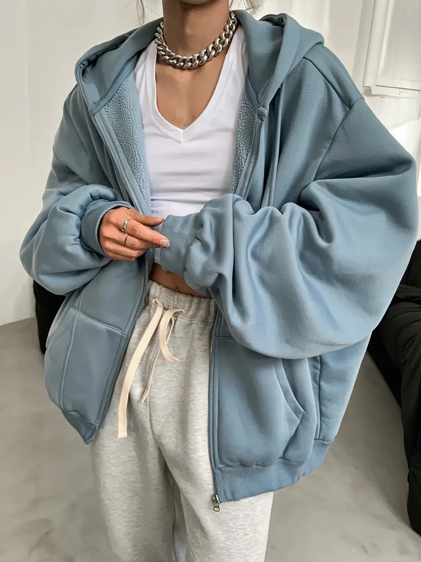 Trendy hoodie outfits 2026 Soft Blue Layers With an Edgy Silver Accent