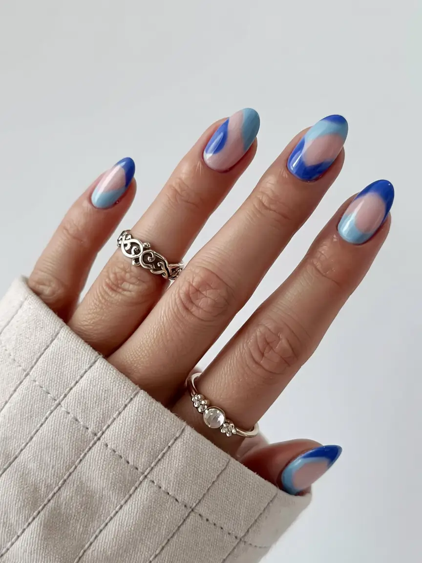 almond nails 2026 Split Swirl in Soft Blue and Pink