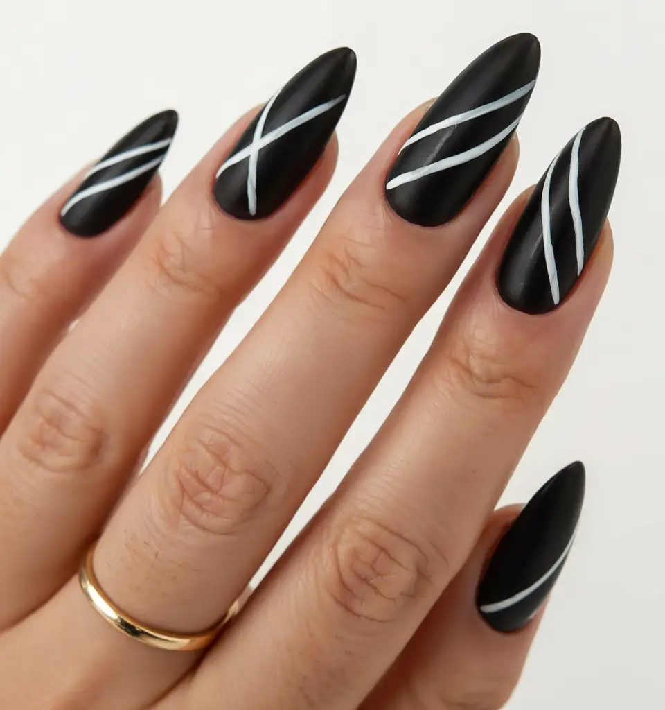 black nails 2026 Matte & Minimalist: Crossed Lines