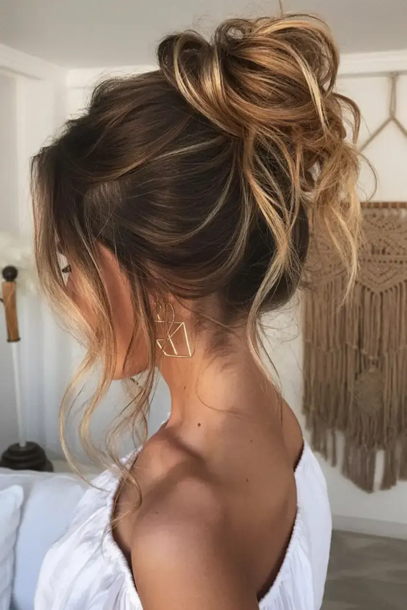 buns hairstyle ideas 2026 Sun-Kissed Boho Bun