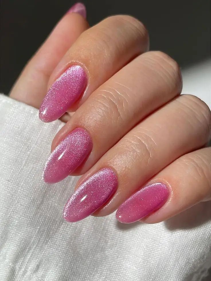 cat eye nails 2026 Sparkling Raspberry With Sunbeam Highlights