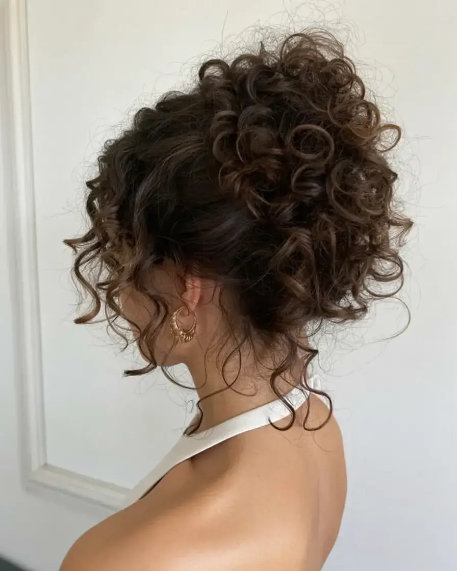 curly hairstyle ideas 2026 Effortless Updo With Voluminous Curls