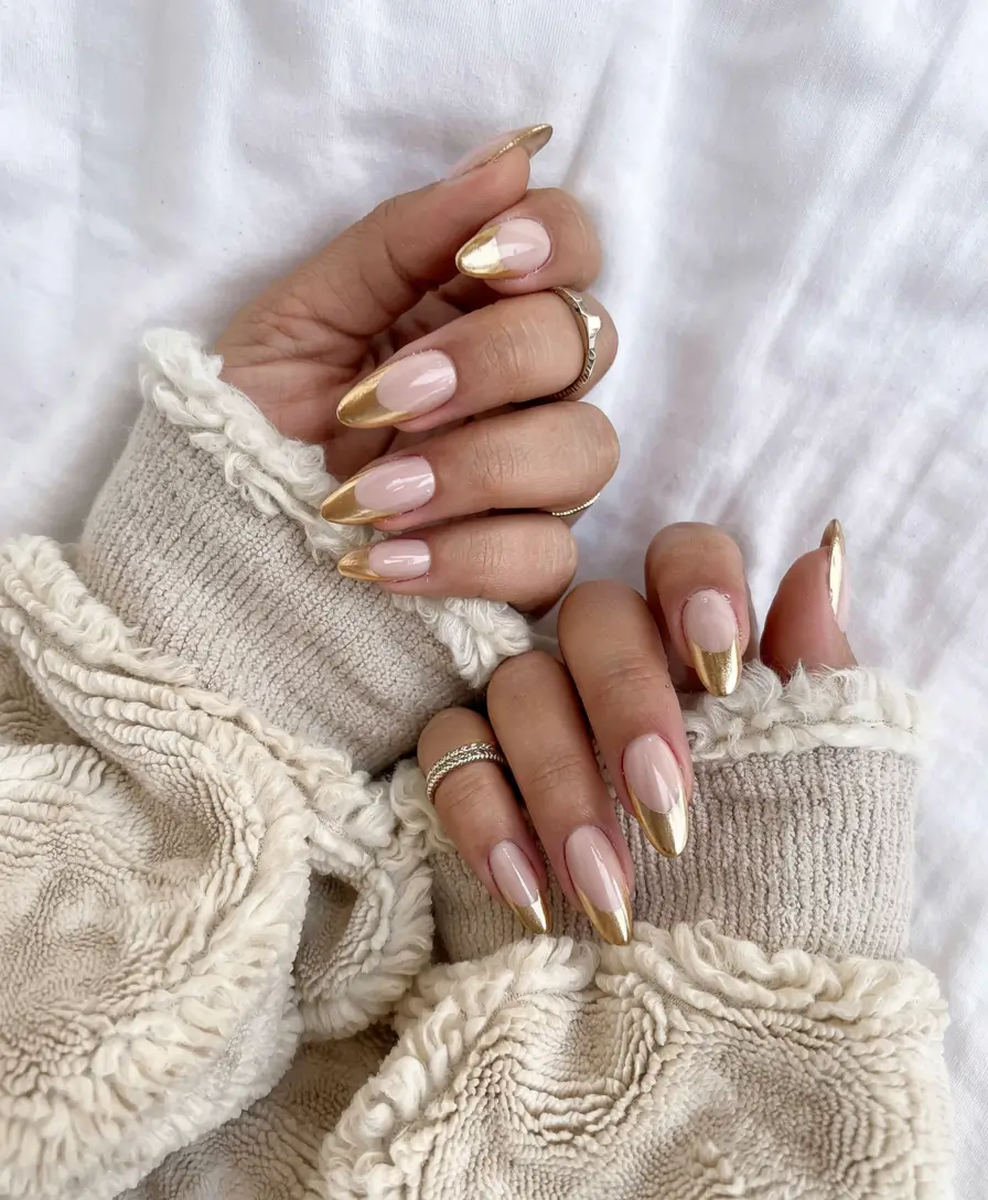 gold nails 2026 Golden Reverse French with a Glossy Nude Base