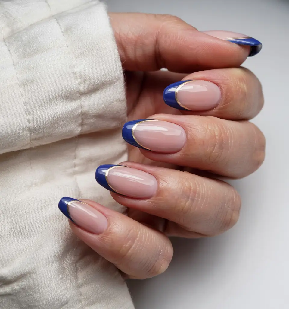 simple nails 2026 Royal Blue French With a Golden Touch