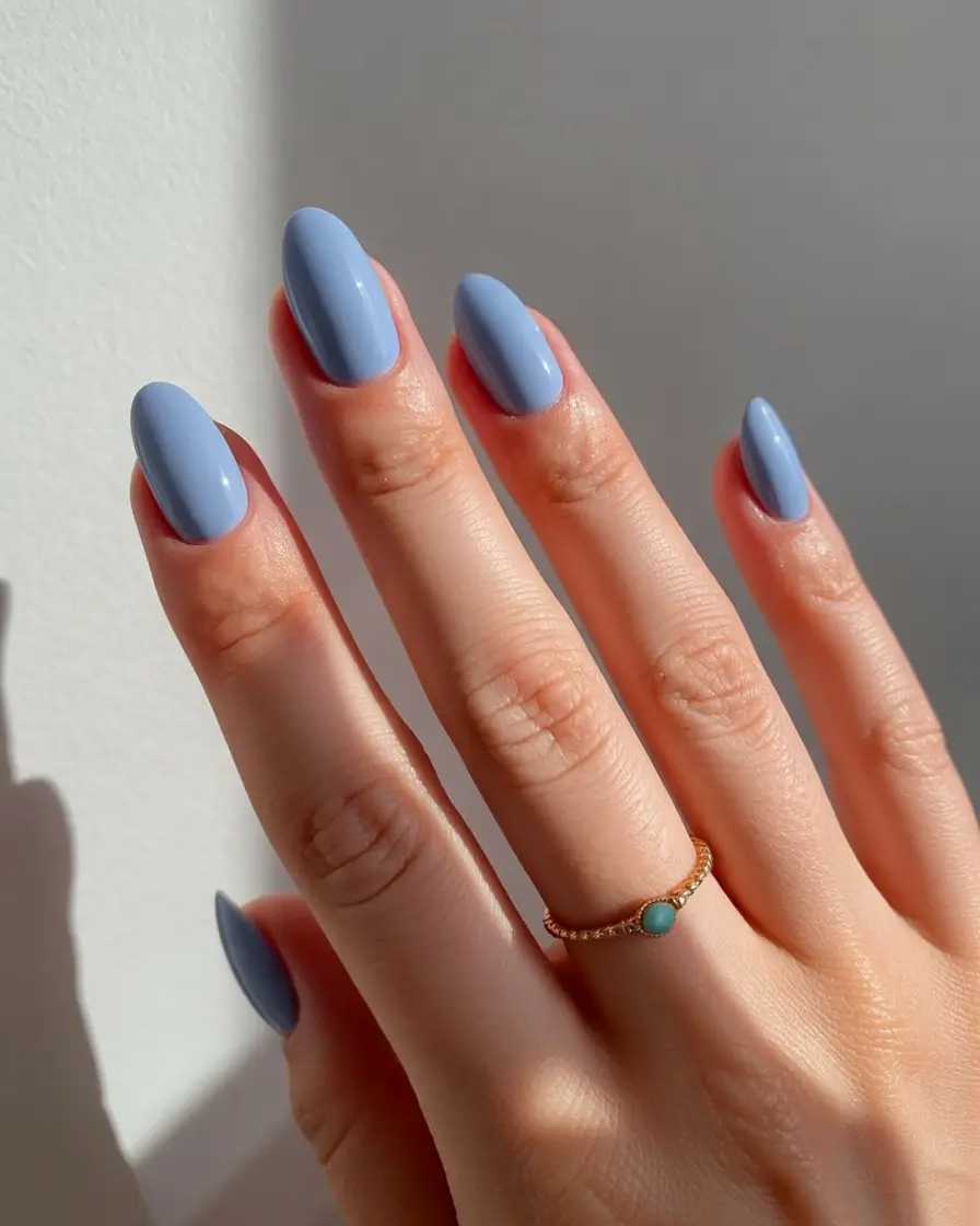 acrylic spring nails trends 2026 Sky-Blue Simplicity With a Clean Almond Finish