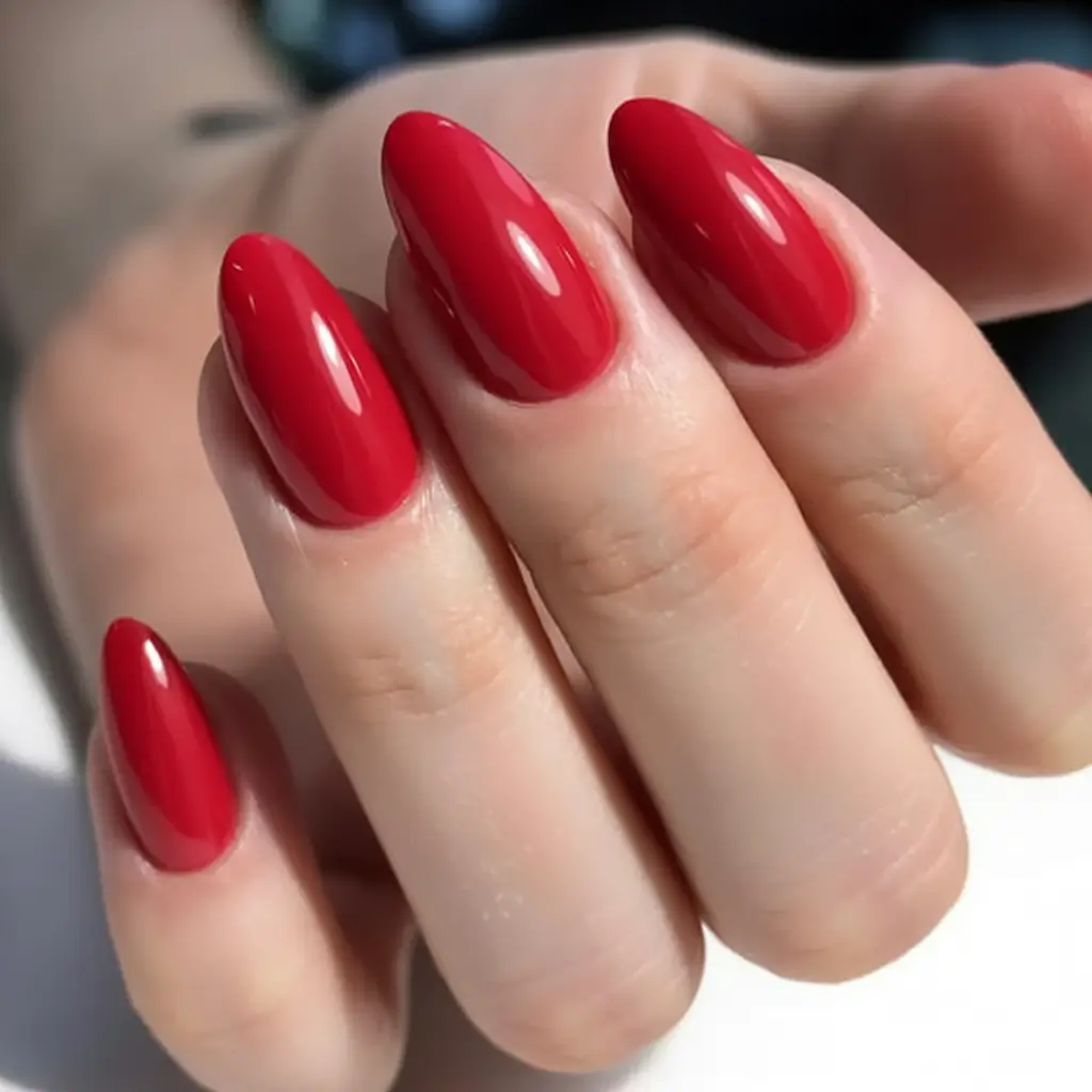 acrylic spring nails trends 2026 Candy-Apple Red With a Clean Almond Curve