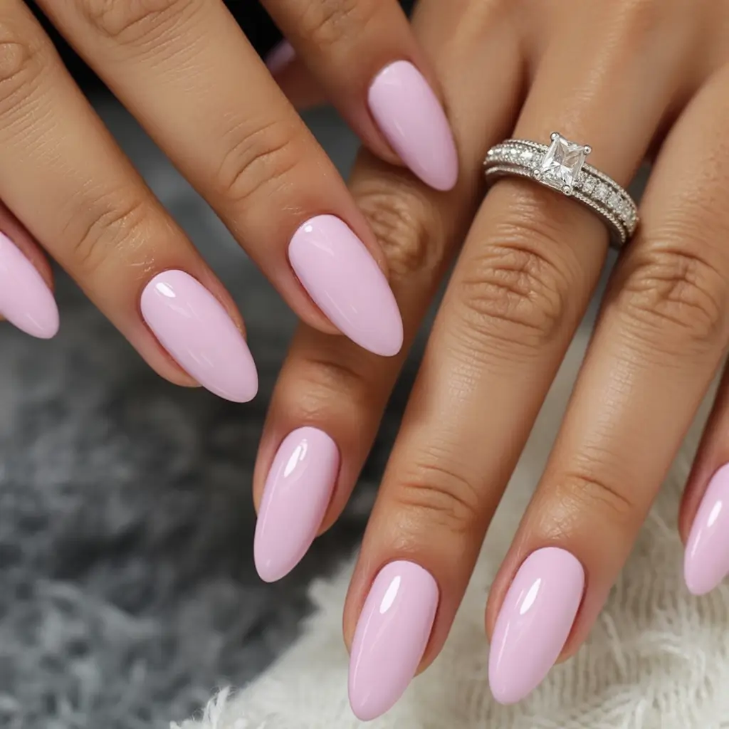 acrylic spring nails trends 2026 Cotton-Candy Pink With a Glossy, Almond-Shaped Finish