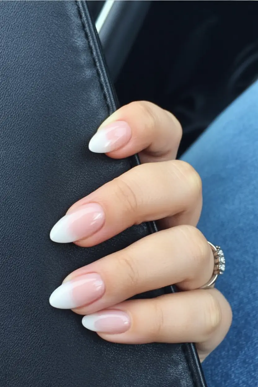 aesthetic spring almond nails 2026 Milky White Fade Almond