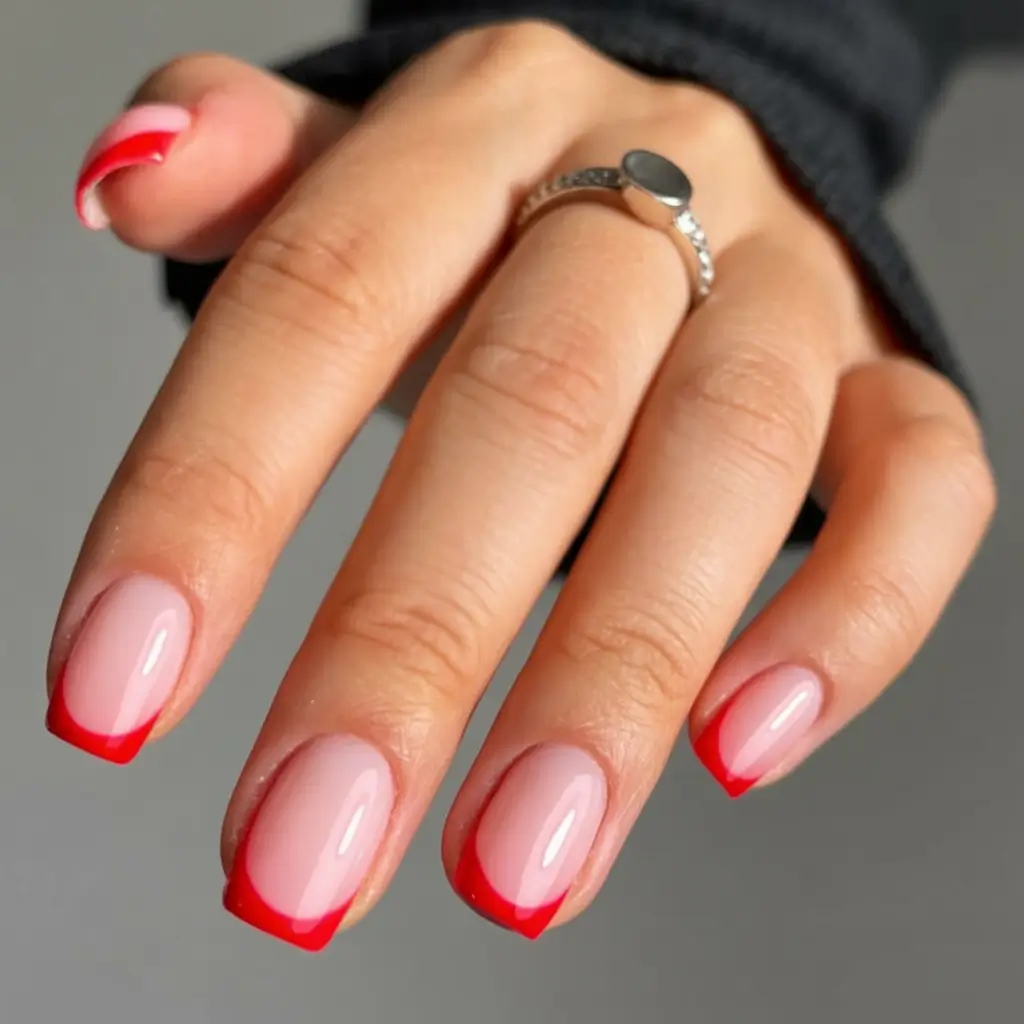 awesome spring french tip nails 2026 Classic Red French Tips on Short Nails for a Chic Contrast