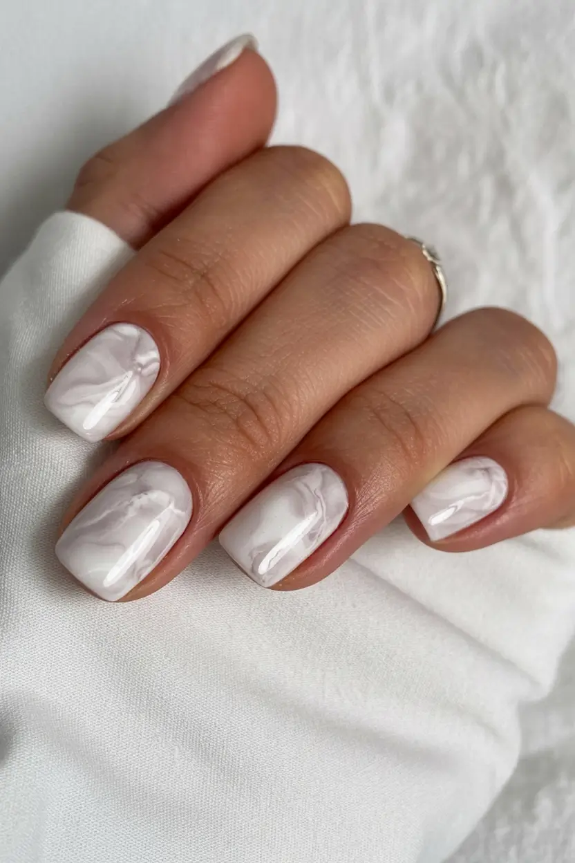 cozy spring wedding nails 2026 Milky White Marble Minimalism
