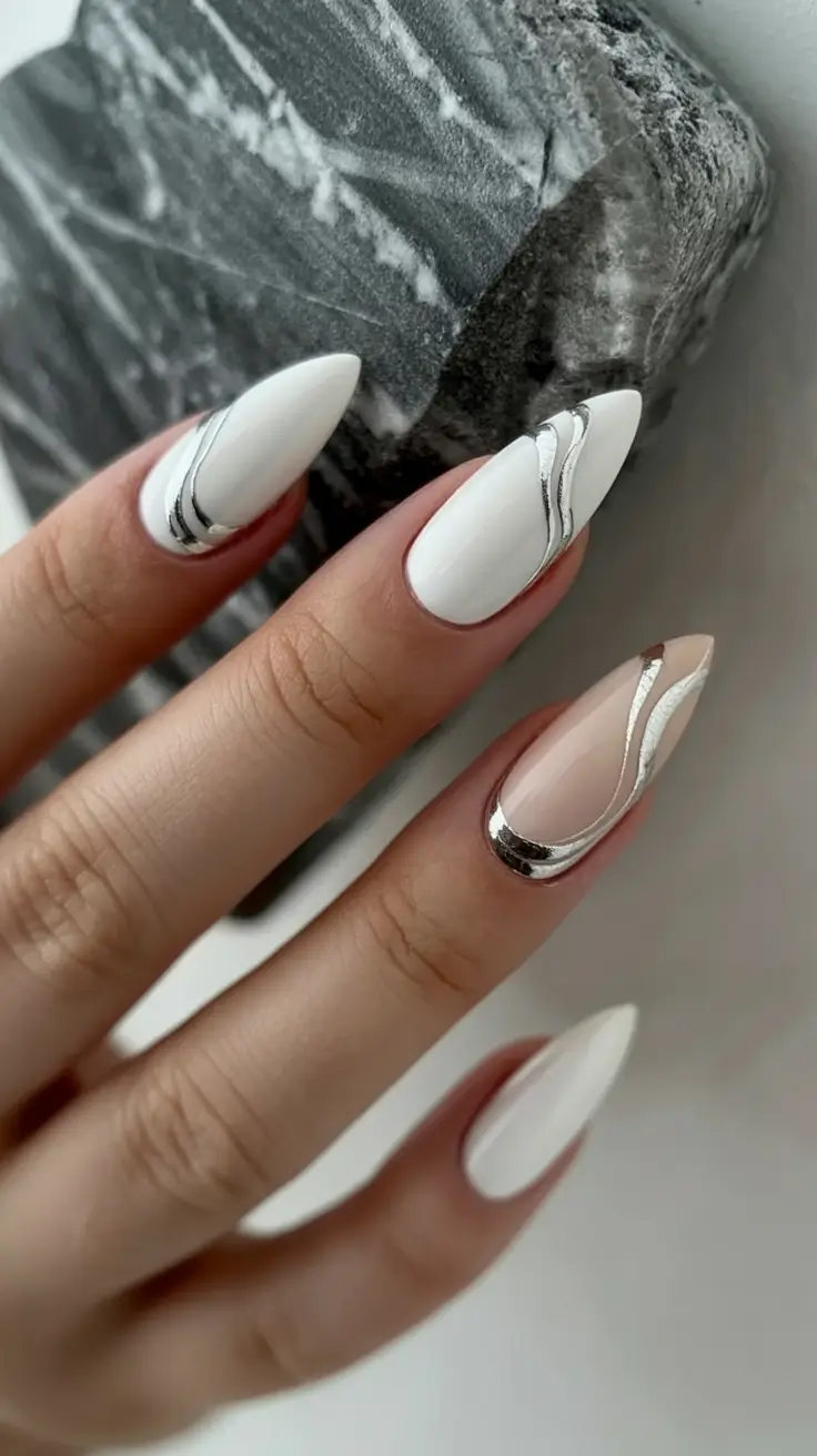 cozy spring wedding nails 2026 Modern Ivory with Liquid Silver Waves